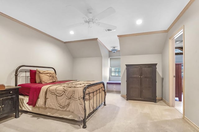 bedroom with ceiling fan, crown molding, light carpet, and vaulted ceiling