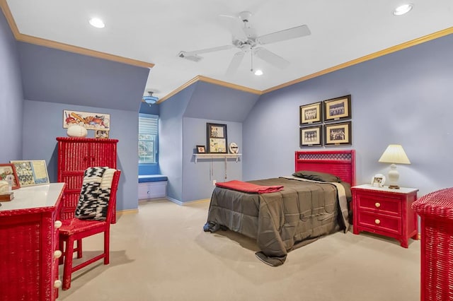 carpeted bedroom with vaulted ceiling, ceiling fan, and crown molding