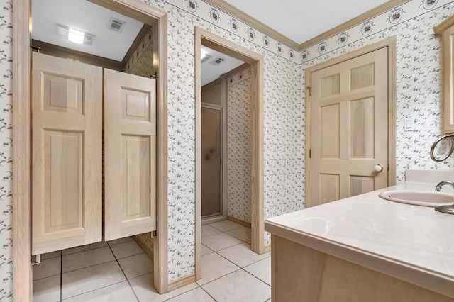 2101 Fm 1007, Brookeland, TX 75931 - bathroom with tile patterned flooring, vanity, a shower with door, and ornamental molding