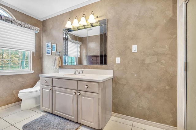 bathroom featuring tile patterned flooring, vanity, ornamental molding, and toilet