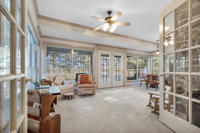 sunroom / solarium with french doors and ceiling fan