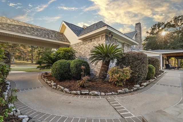 view of property exterior at dusk