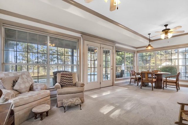 sunroom / solarium with ceiling fan and a wealth of natural light