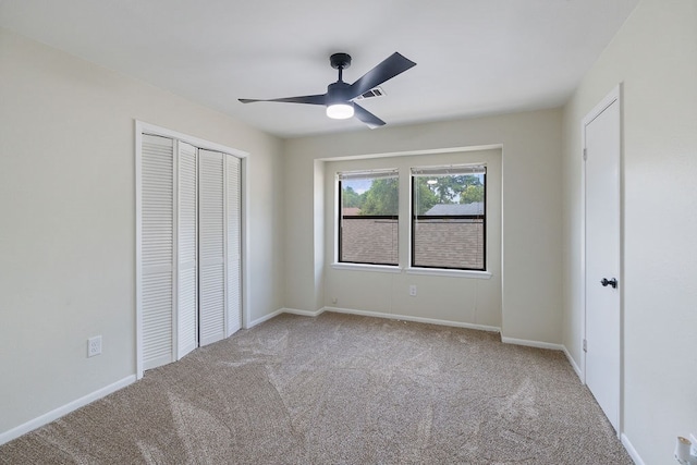 112 Westchester St, Lufkin, TX 75901 - unfurnished bedroom with carpet, a closet, and a ceiling fan