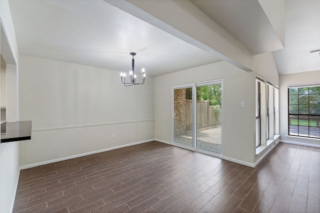 112 Westchester St, Lufkin, TX 75901 - unfurnished dining area featuring wood finished floors and a chandelier