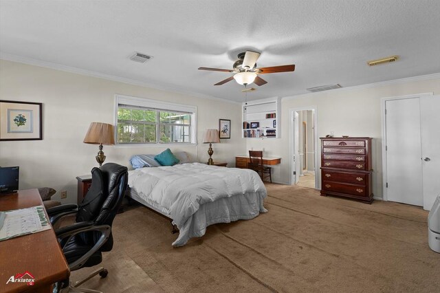 140 Eastwood Dr, Milam, TX 75959 - carpeted bedroom featuring an office area, ornamental molding, and ceiling fan