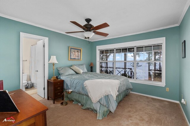 140 Eastwood Dr, Milam, TX 75959 - bedroom with crown molding, light colored carpet, baseboards, ceiling fan, and connected bathroom