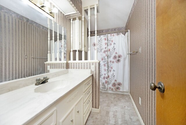 bathroom with vanity and shower / bath combination with curtain