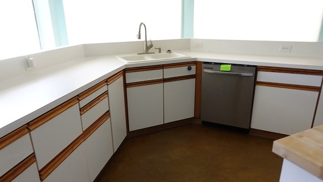 600 Daily St, Jasper, TX 75951 - kitchen with dishwasher, light countertops, and white cabinets