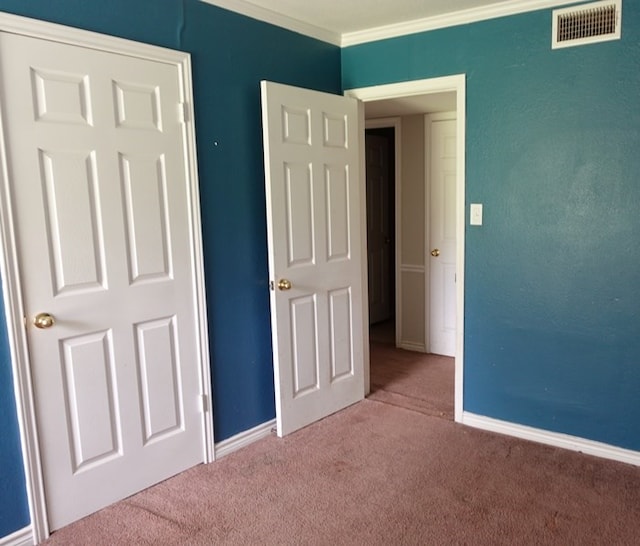 600 Daily St, Jasper, TX 75951 - unfurnished bedroom with carpet and ornamental molding