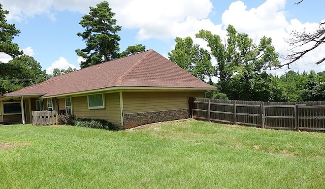 600 Daily St, Jasper, TX 75951 - view of property exterior with a shingled roof and stone siding