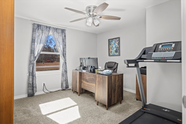 office space with light carpet and ceiling fan