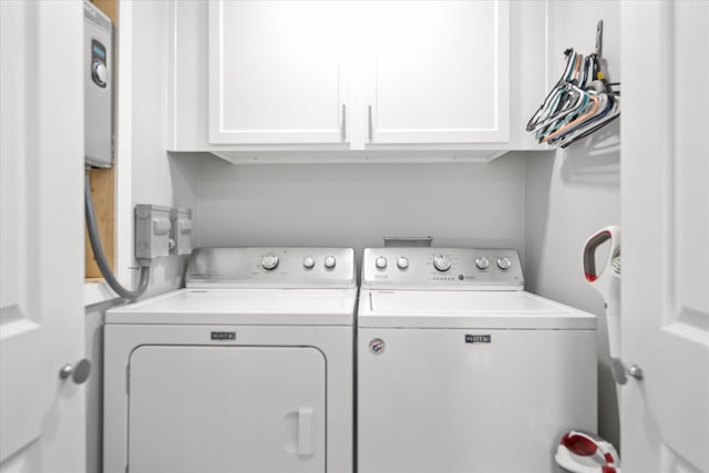 laundry area with cabinets and separate washer and dryer