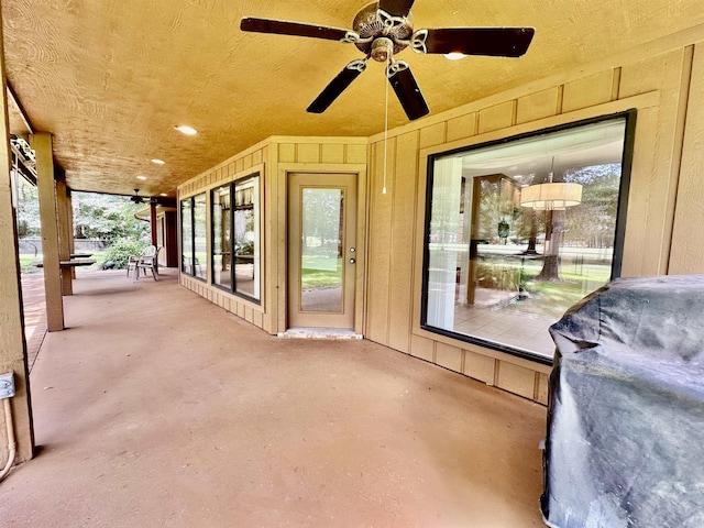 view of patio featuring ceiling fan