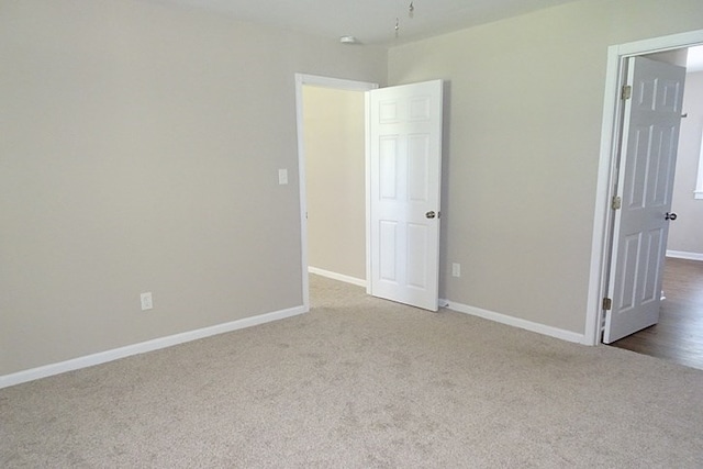 unfurnished bedroom with carpet flooring