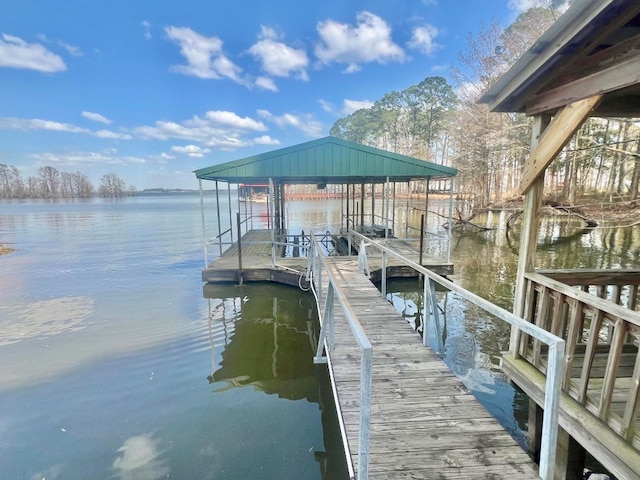 dock area featuring a water view and boat lift