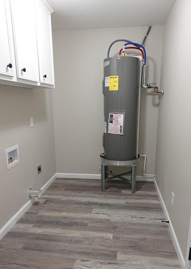 1604 Lilac Ave, Lufkin, TX 75901 - utility room featuring electric water heater