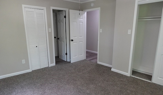1604 Lilac Ave, Lufkin, TX 75901 - unfurnished bedroom with dark carpet, ornamental molding, and baseboards