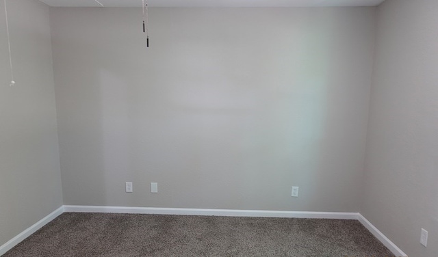 1604 Lilac Ave, Lufkin, TX 75901 - carpeted spare room with baseboards