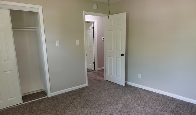 1604 Lilac Ave, Lufkin, TX 75901 - unfurnished bedroom with carpet, baseboards, and a closet