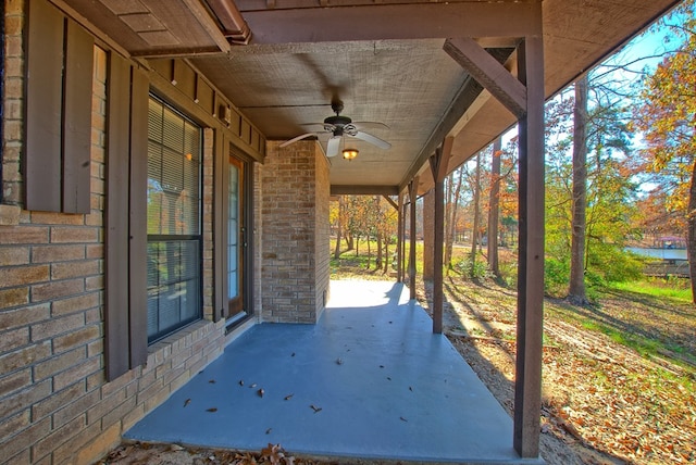 view of patio featuring ceiling fan