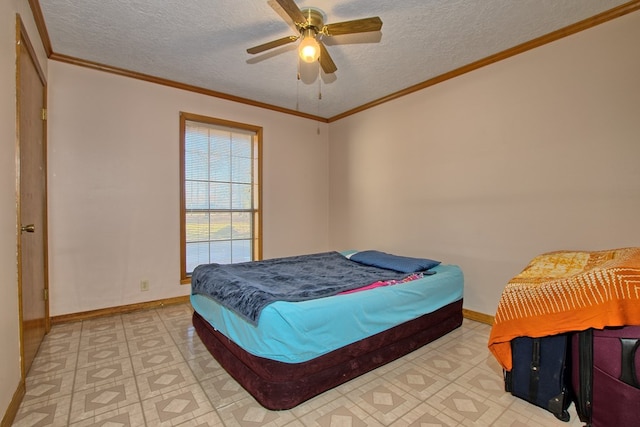 bedroom with ceiling fan, crown molding, and a textured ceiling