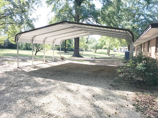 view of parking featuring a detached carport