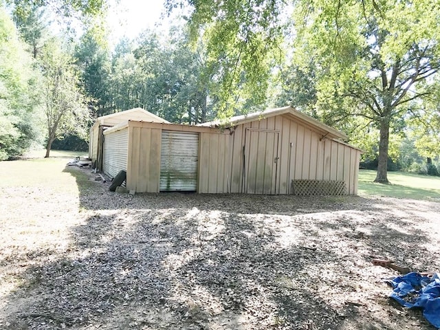 view of outbuilding with an outbuilding