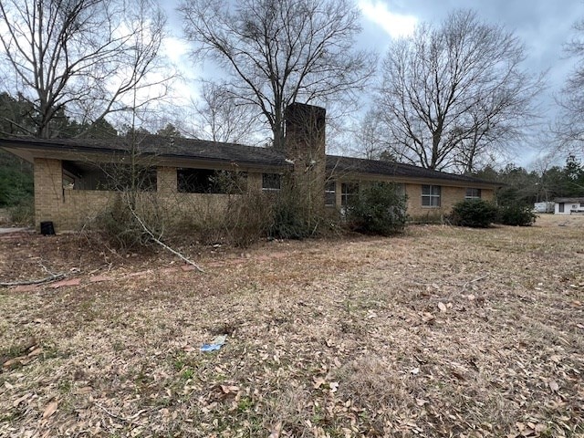 back of property with brick siding