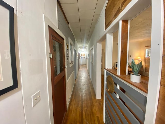 hallway featuring dark wood-type flooring