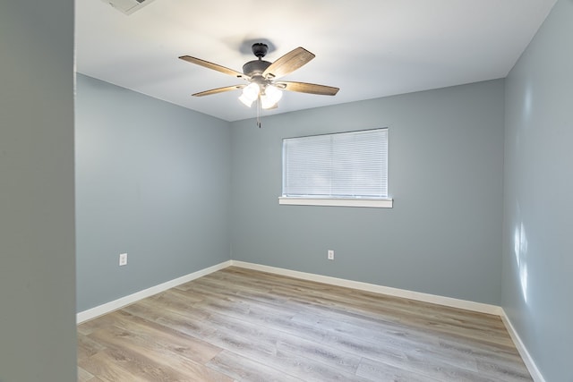 spare room with ceiling fan and light hardwood / wood-style floors