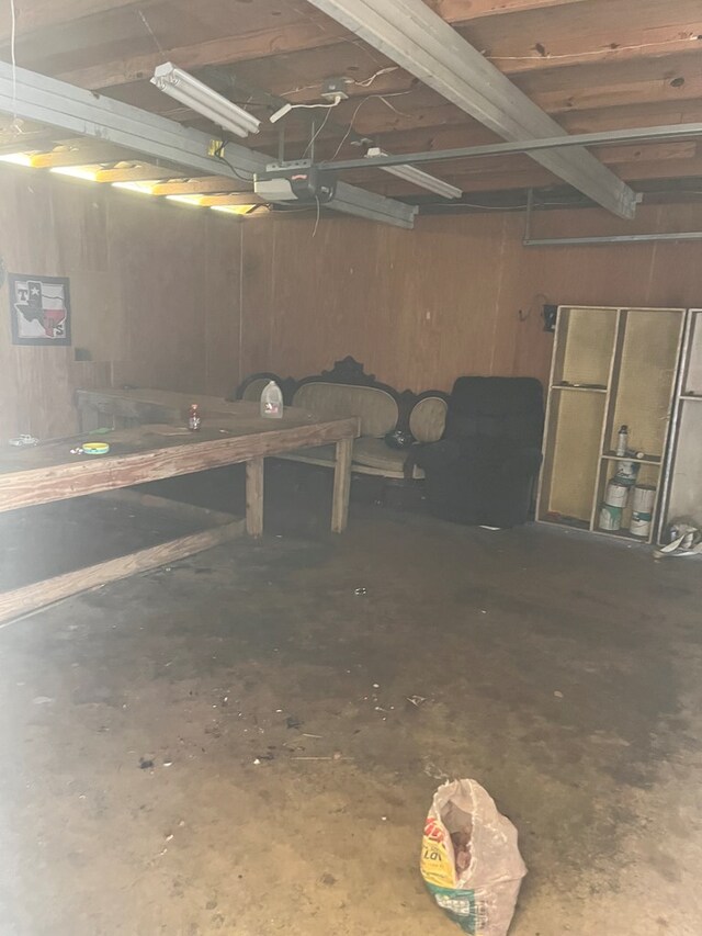 interior space featuring wood walls
