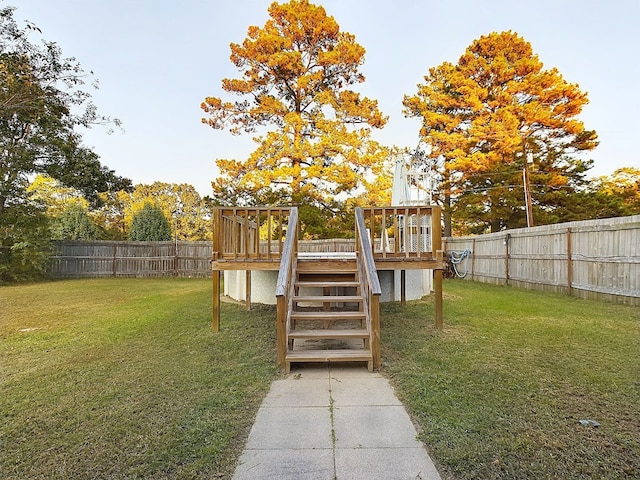 view of yard featuring a wooden deck