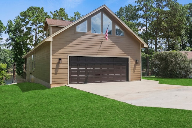 garage with concrete driveway