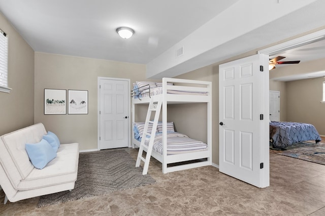 bedroom featuring baseboards