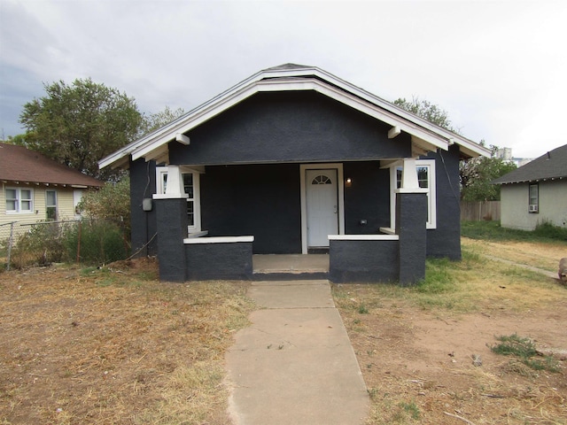 bungalow featuring covered porch