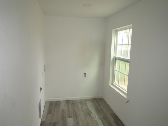 409 W 4th St, Hereford, TX 79045 - spare room with light hardwood / wood-style flooring and plenty of natural light