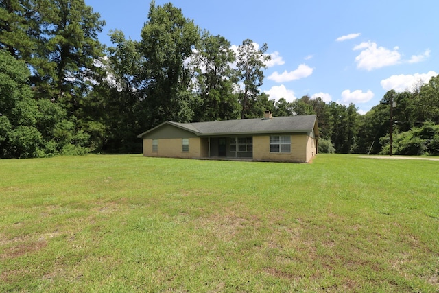 view of front of home with a front lawn