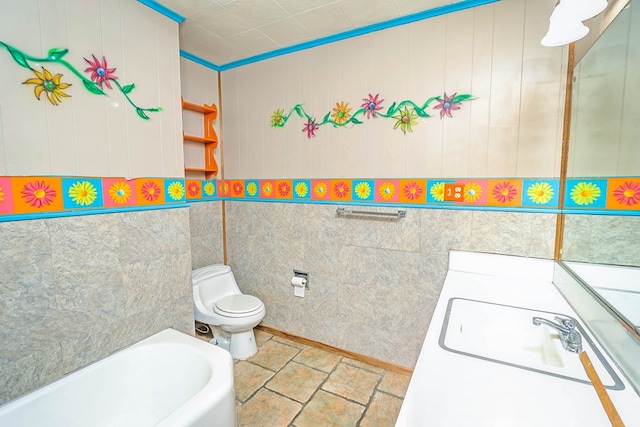 303 W Stringer, Kirbyville, TX 75956 - full bathroom with a tub, toilet, tile walls, stone finish floors, and vanity
