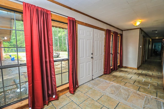 303 W Stringer, Kirbyville, TX 75956 - entryway with stone tile floors and crown molding