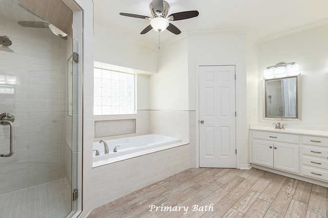 bathroom featuring vanity, wood-type flooring, ornamental molding, and independent shower and bath