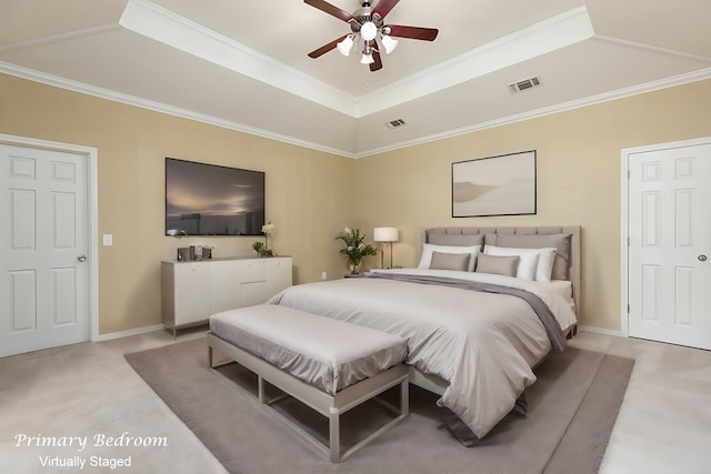 bedroom with a high ceiling, a tray ceiling, ceiling fan, and crown molding