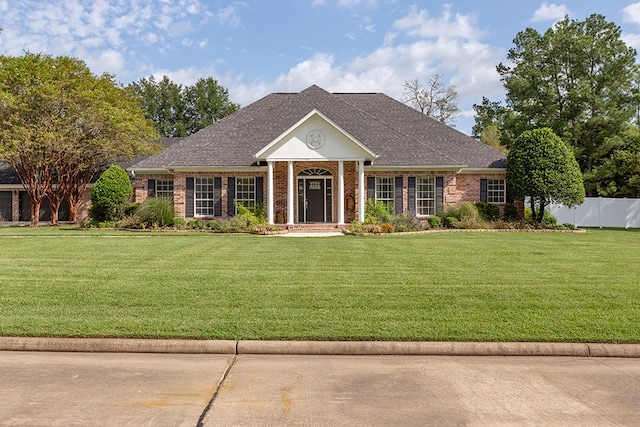 view of front of home with a front lawn