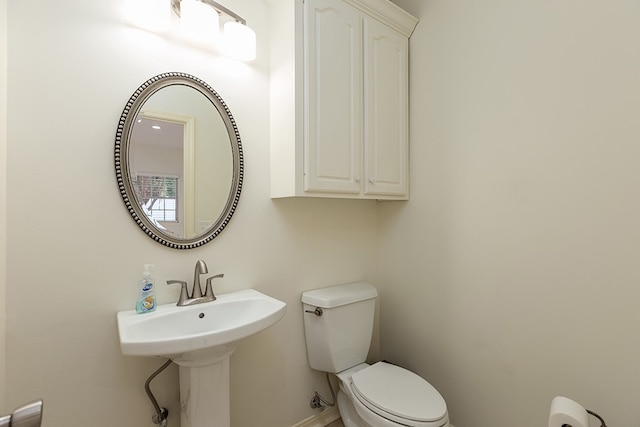 bathroom featuring toilet