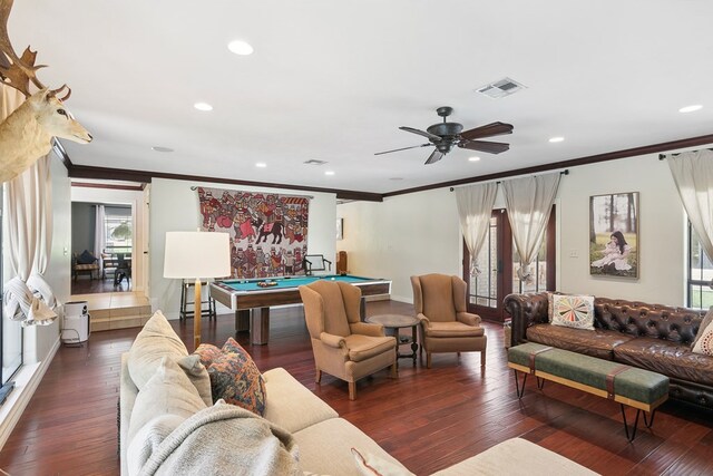 living room featuring ceiling fan, dark hardwood / wood-style flooring, ornamental molding, and pool table