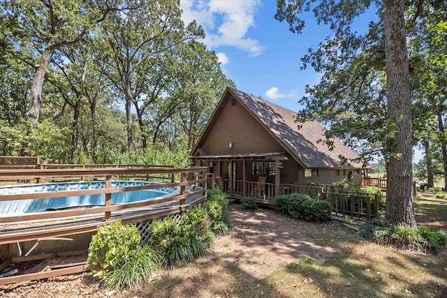 view of pool featuring a wooden deck