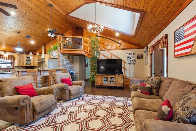 living area with high vaulted ceiling, wood ceiling, dark wood-style floors, and ceiling fan with notable chandelier