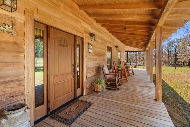 doorway to property with covered porch