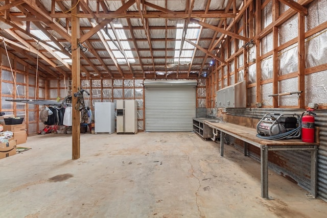 garage with freestanding refrigerator