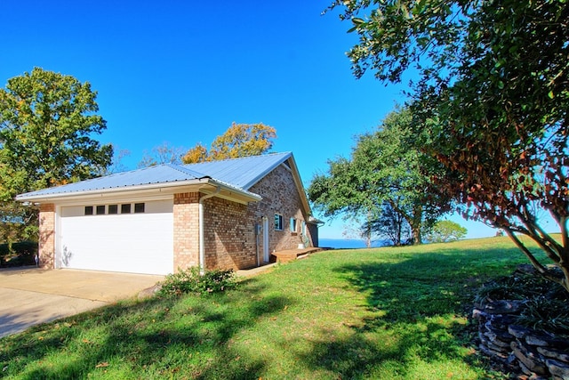 160 Somerset, Milam, TX 75959 - view of side of home featuring a garage and a yard